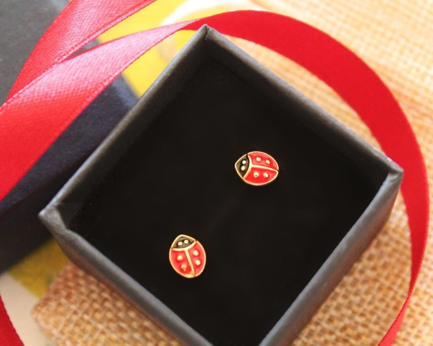 Ladybug gold earrings in their elegant gift box included