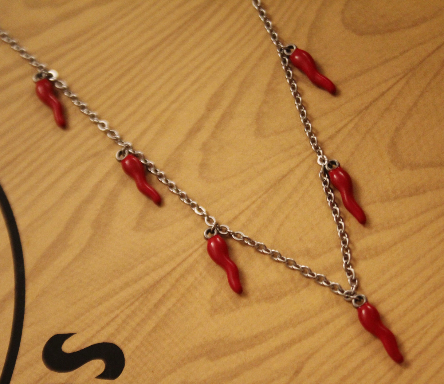 Sevenfold Red Cornicello Necklace: Amplify Your Luck!