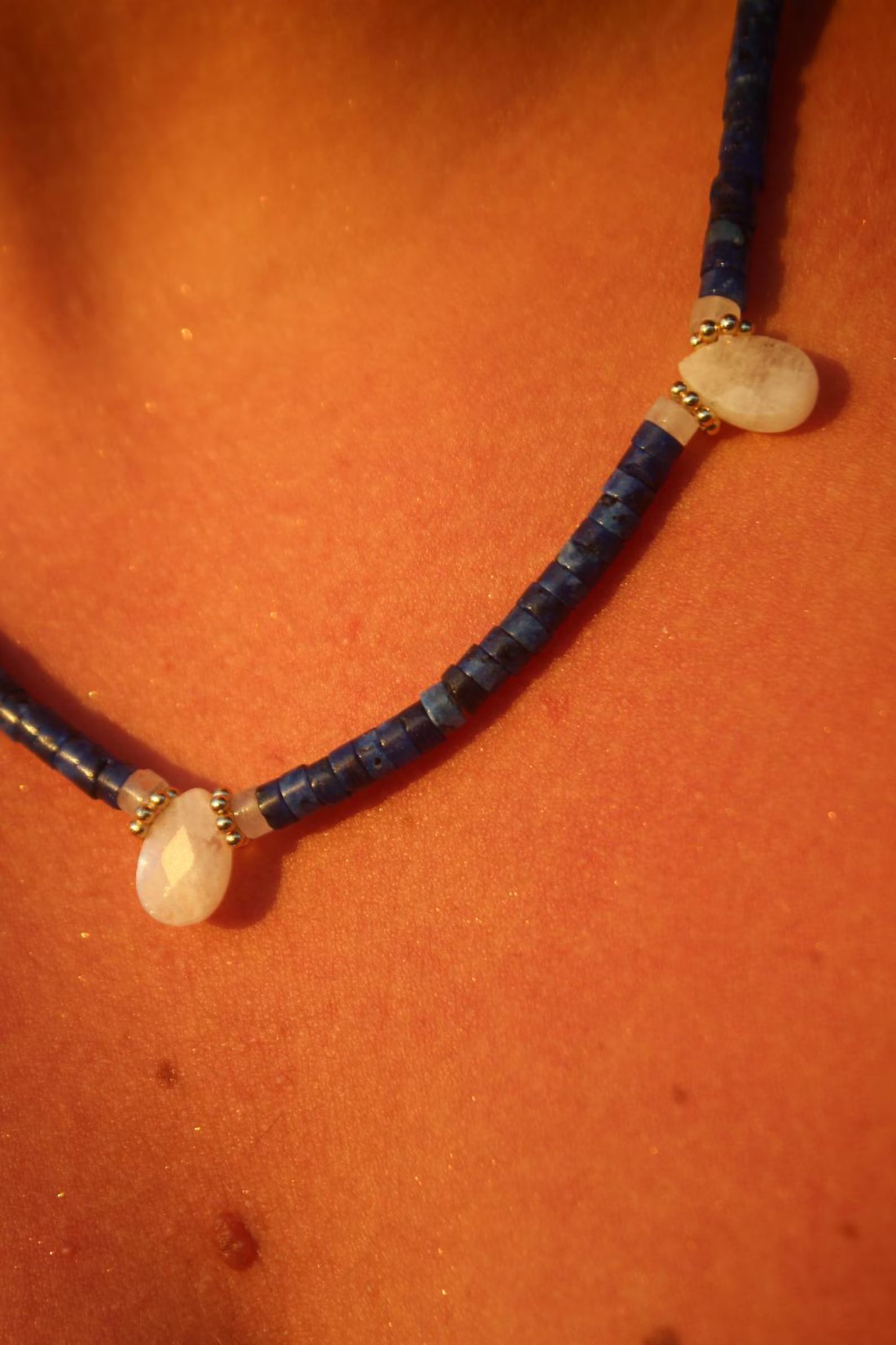 Moonstone pendant and lapis lazuli bead detail